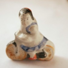 Old local toy, a girl on a