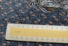 Pack of 180 small metal paper clips. 21mm