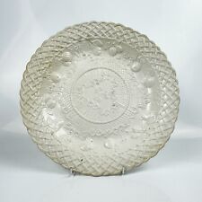 A superb salt glazed stoneware plate. Basketweave and fruit moulding. c.1760