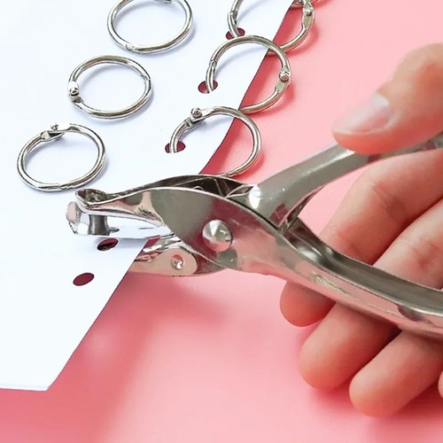 Hole punch metal hand - hand, one