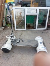 golf board  electric stand on golf  buggy  white good  condition  used 