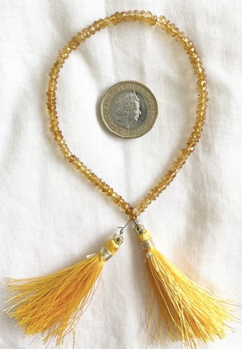 Faceted citrine gemstones - faceted,