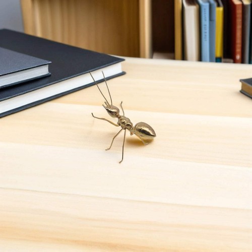 Golden metal ant sculpture - ant,
