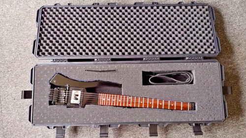 Wheeled electric guitar - wheeled,