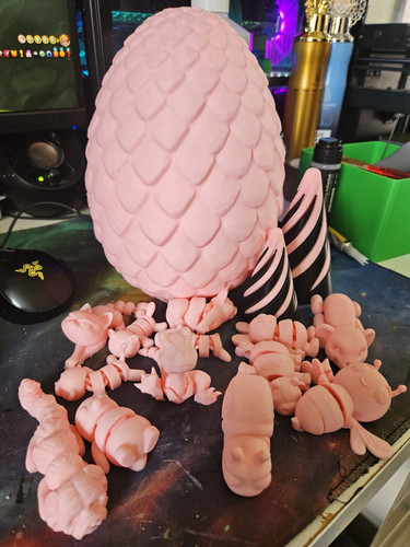 Pink egg and fidgets - egg,