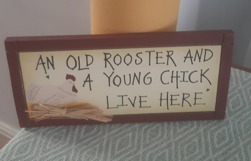 Old rooster and a - old, young