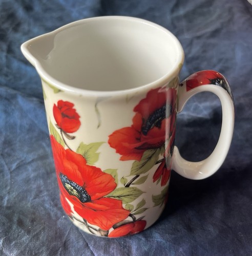 Heron cross pottery milk jug - heron,