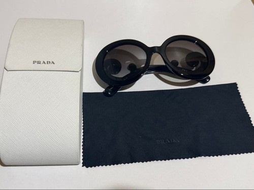 Excellent prada black round - excellent,