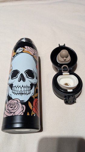 Skull and roses water - and,