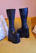 Demonia Stack 301 Black Knee