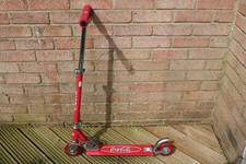 Coca Cola branded scooter with adjustable handle bars and back brake