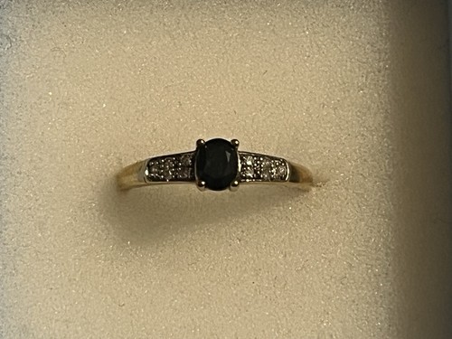Yellow gold black gem - 9,