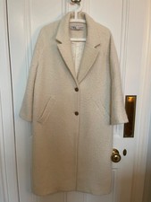 Winter white long  Zara coat with side pockets.