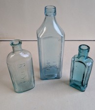 Bundle of 3 Vintage/Antique Embossed Clear Glass Chemist/Medicine Bottles.