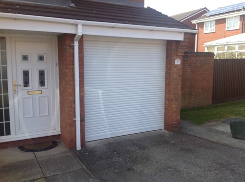 Electric garage door roller - garage,