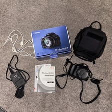 Canon PowerShot SX30 IS 14.1MP Digital Camera - Black and bag 