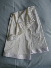 White waist petticoat with patterned hem - length 28ins - waist 24 -32 ins