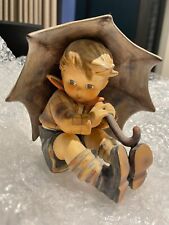 Hummel Goebel figurine, a set of umbrella boy and girl
