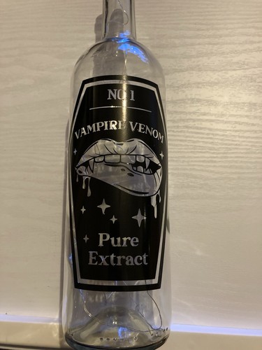 Light wine bottle vampire - light,
