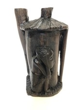 African Wood Carving of Man in Tree Hut