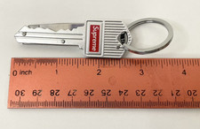 NEW Supreme S/S Metal Keychain w/ Knife Silver Metal Red Logo Men's Clothing