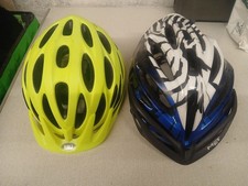 2 X Bike Helmets .1 Bell. 1 Met .
