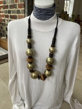 Chunky wooden and brass - and,