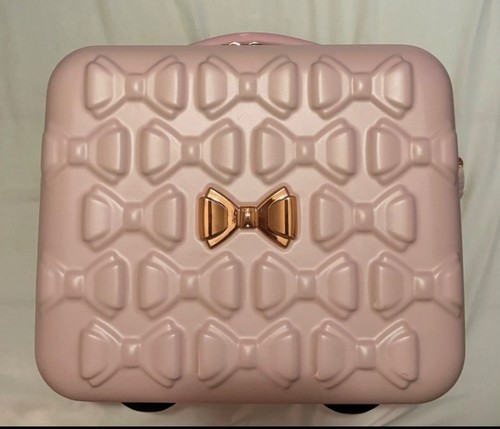 Pink and gold ted - baker, bow