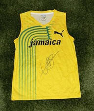 USAIN BOLT SIGNED JAMAICA RUNNING OLYMPICS 2008 VEST