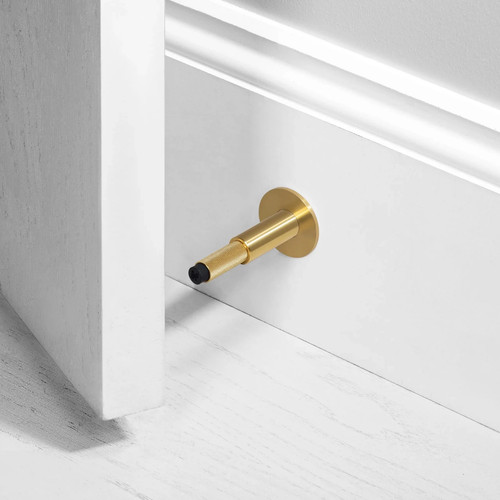 Buster and punch door stop - -,