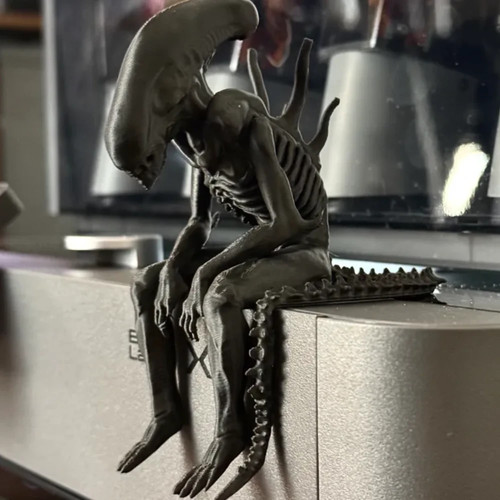 Sad alien figurine - alien,