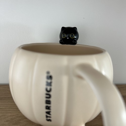 Starbucks black cat sitting - black, on