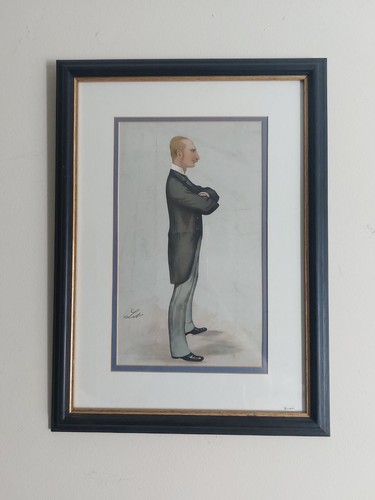 Framed vanity fair cartoon - framed,