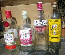 Four Empty Gin Bottles for