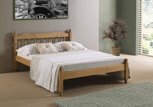 Waxed wood pine bed