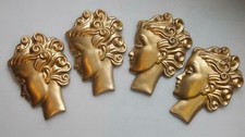 Four hanging Wall Masks Pre