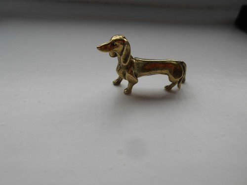 Small brass dachshund sausage - brass,