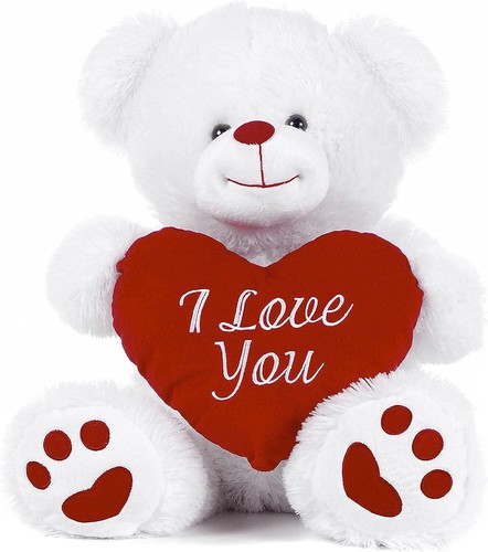 White teddy bear holding red - holding,