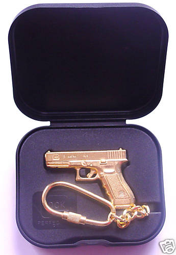 Glock pistol gold - glock,
