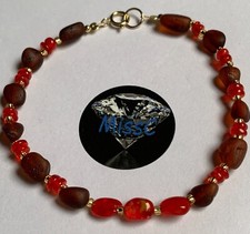9CT GOLD RED MEXICAN FIRE OPAL AND RUBY BALTIC AMBER BRACELET