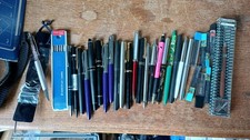 A Large Collection Of Pens -