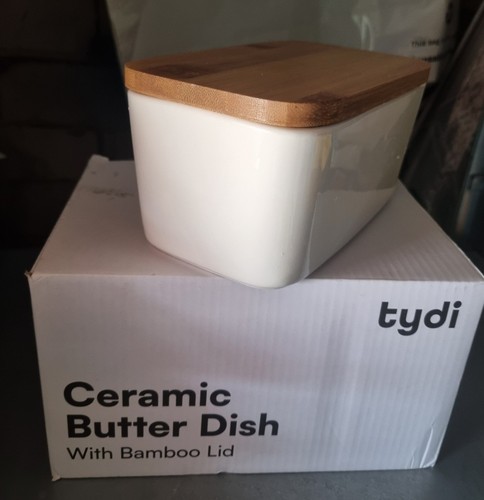 Ceramic butter dish with - butter,