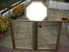 Two old ornate gold framed mirrors in matching frames
