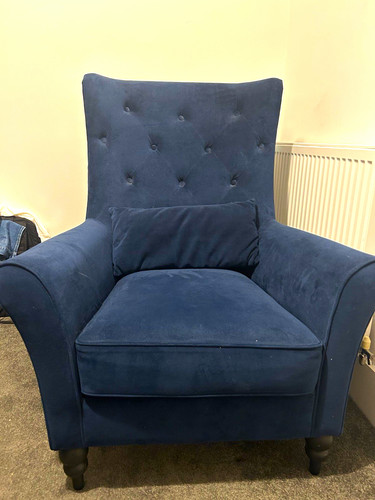 Blue armchair with rolled - with,