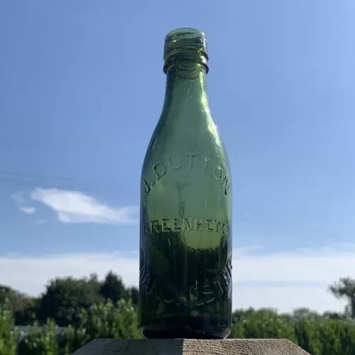 Old glass bottle dutton - old,