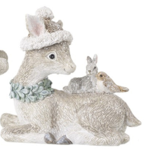 Sitting baby deer fawn - sitting, with