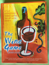 The Wine Game. “A superior drinking game for 2-8 players.” (It says!?) Unused. 