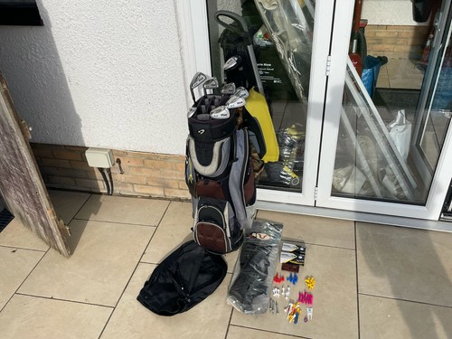 Left handed golf - left, clubs,suit