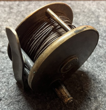ANTIQUE SMALL BRASS FISHING REEL WITH LINE GOOD CONDITION FOR AGE