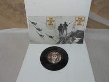 the world at war 7" record fold out cover in good condition